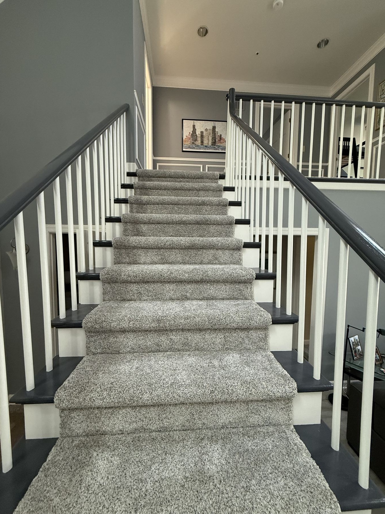 Staircase with new carpet runner installation