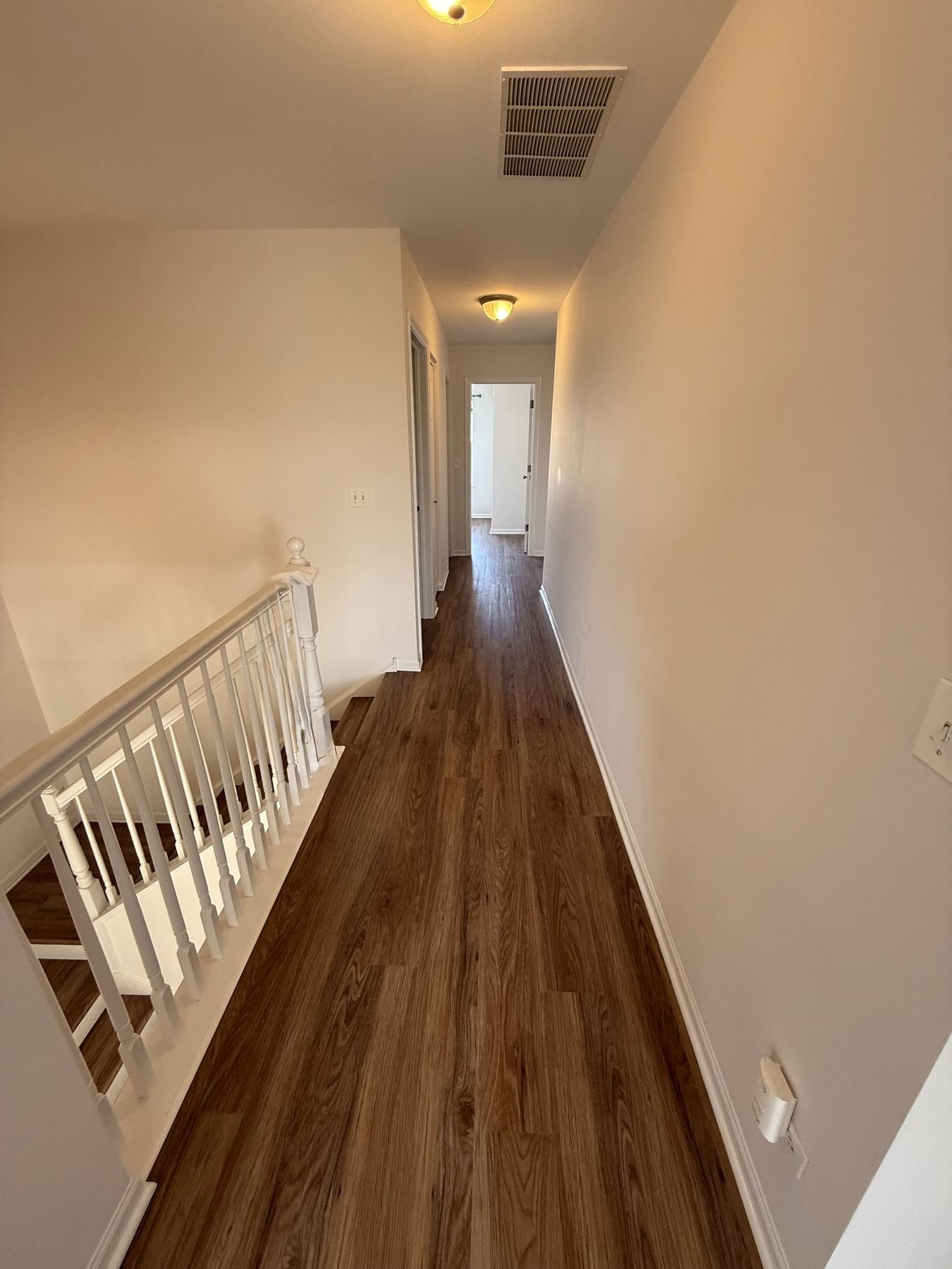 Upper hallway with new luxury vinyl plank flooring